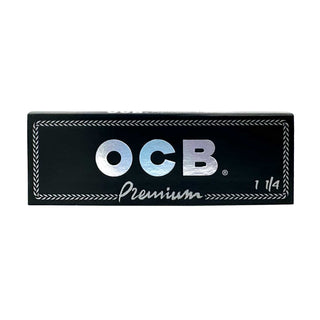 OCB rolling paper pack with metallic logo on a white background