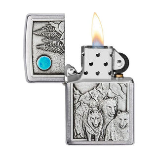 Zippo lighter with wolf design and turquoise stone on a white background