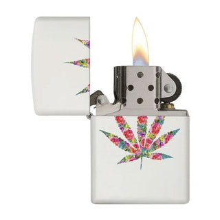 Floral leaf design on a Zippo lighter with flame.