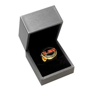 Gold ring with 'R.A.W.' logo in a black box