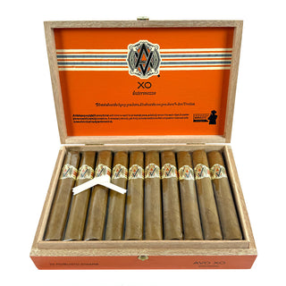 Open wooden cigar box with cigars and orange interior displaying AVO XO Intermeso branding.