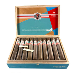 Open wooden box of Avo Syncro Caribe cigars with a colorful label on a white background
