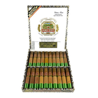 Open box of Arturo Fuente cigar on white background