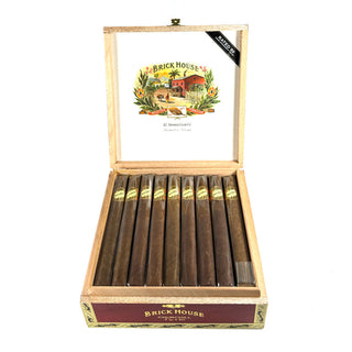 Open wooden box of Brick House cigars with cigars inside on a white background