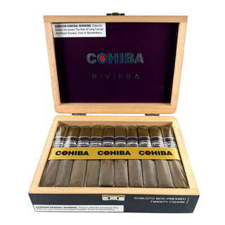 Open Cohiba Riviera cigar box with cigars inside on a white background