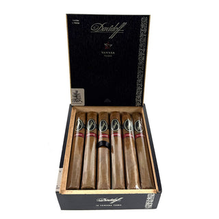 Open box of Davidoff Yamasa Toro cigars with cigars inside on a white background