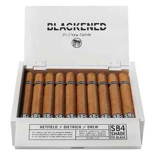 Box of Blackened S84 by Drew Estate cigars with cigars inside on a white background