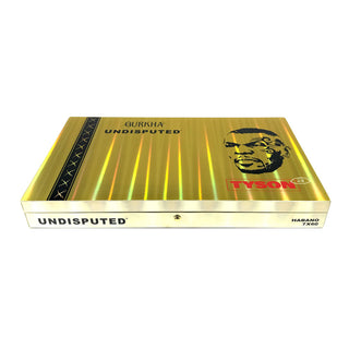 Gold cigar box with 'Tyson' and 'Gurkha' branding and face on a white background