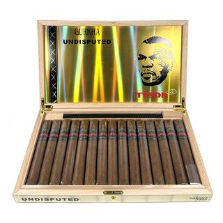 Open wooden box of Gurkha Undisputed Tyson 2.0 Habano cigars on a white background