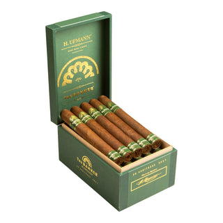 Open green box of H. Upmann cigars on a white background