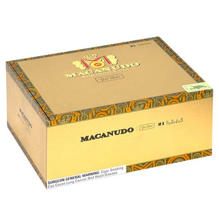 Box of Macanudo Gold Label cigars with decorative patterns on a white background