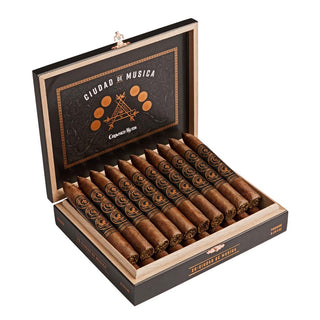 Open Montecristo Crowned Heads cigar box with cigars inside.