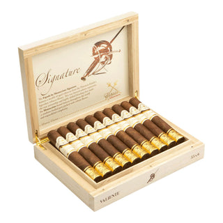 Open wooden Montecristo Espada Signature cigar box displaying cigars with a visible brand logo on a white background