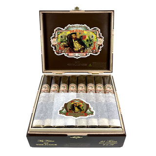 Open box of My Father the Judge Toro cigars with decorative labels on a white background