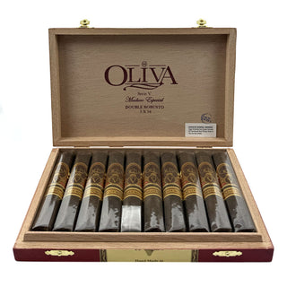 Open wooden box of Oliva Serie V Maduro cigars on a white background