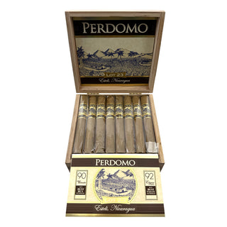 Perdomo Lot 23 Connecticut cigars in an open wooden box on a white background
