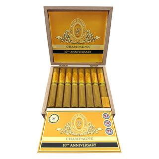 Box of Perdomo 10th Anniversary cigars with decorative labels on a white background