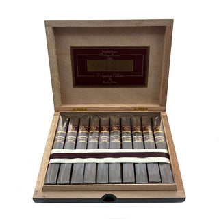 Open wooden cigar box with Rocky Patel Vintage 1990 Broadleaf cigars inside on a white background