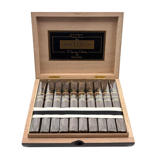 Open wooden cigar box with Rocky Patel Vintage 1992 Sumatra cigars inside on a white background
