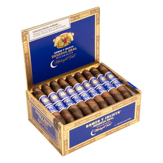 Open box of Romeo Y Julieta Reserva Real Nicaragua Midnight Twist cigars with blue and gold packaging.