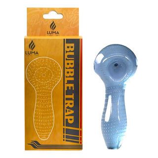 Blue glass bubble trap next to its packaging with Luma branding on a white background