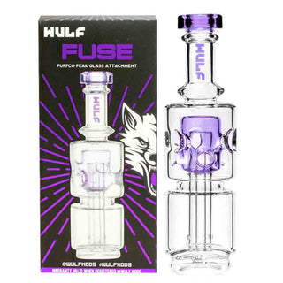 Glass Puffco Peak smoking attachment with purple accents and Wulf branding on packaging